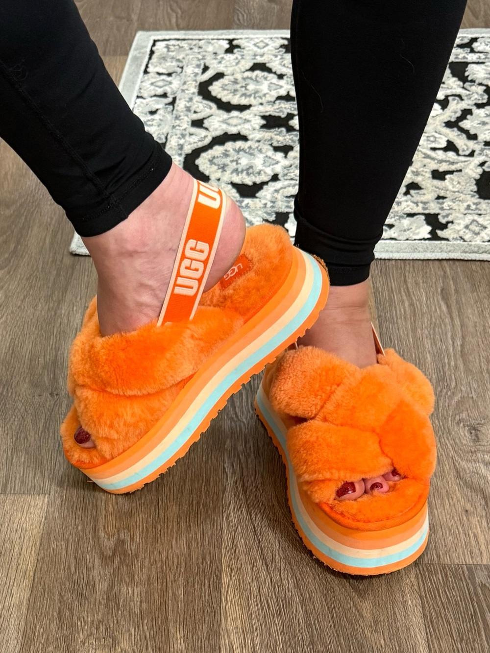 UGG Women's Orange Faux-Shearling Platform Slides with Branded Heel Strap